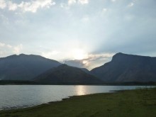 Shafts of light behind the mountains